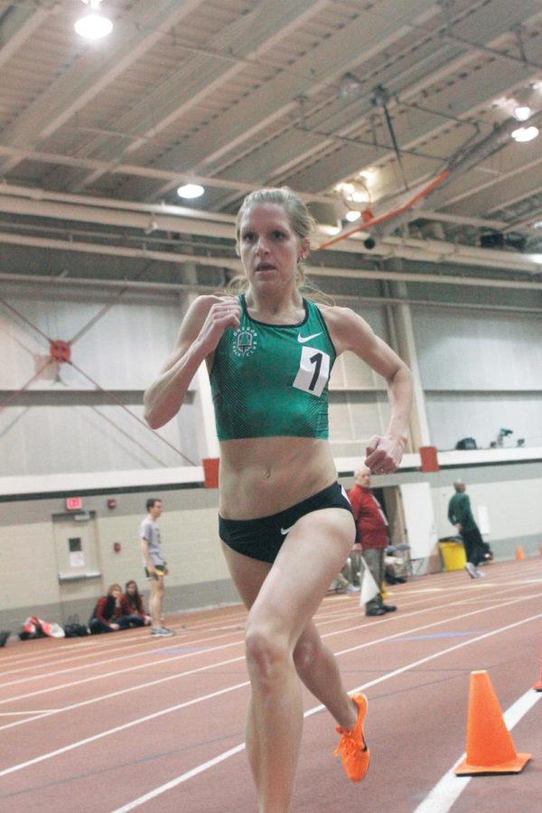 Former ISU track runner Lisa Uhl competes in the the womens 3,000-meter run during the NCAA Qualifier track meet at Lied Recreation Athletic Center on March 3. Uhl finished in first place with a time of 9:08.68. 
