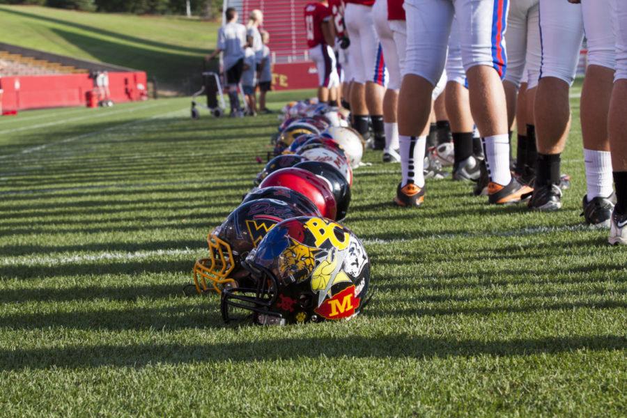 Players on the North Squad line up for the National Anthem prior to the 2012 Iowa Shrine Bowl. The 2012 Iowa Shrine Bowl was played on July 21 at Jack Trice Stadium. The teams are composed of high school football players selected from various schools across Iowa. South won over North with a final score of 40-7.
