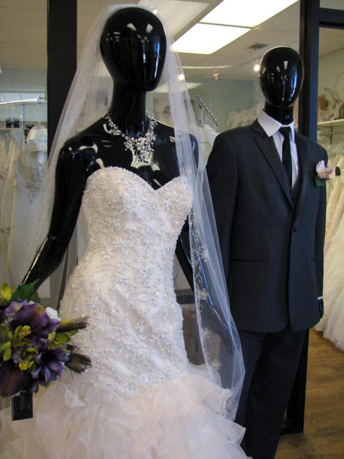 Avoid online shopping for better customer service and better prices. Also, in-store sales racks often offer the best prices on wedding attire.
