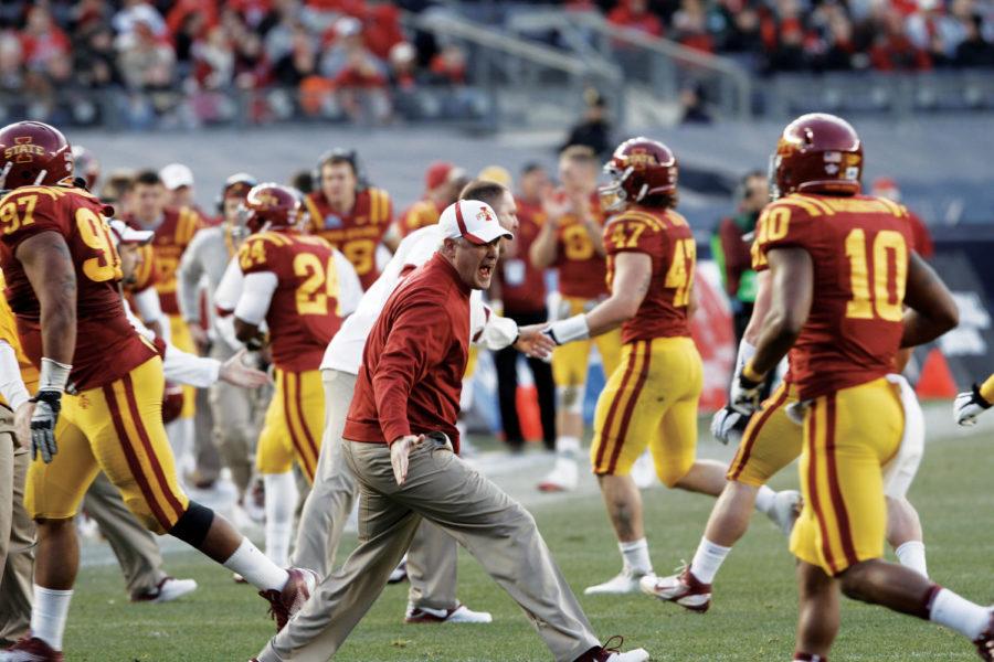 ISU%C2%A0coach+Paul+Rhoads+cheers+on+his+team+as+the+defense%C2%A0runs+to%0Athe+sidelines+during+the+Pinstripe+Bowl+at+Yankee+Stadium.+Iowa%0AState+fell+to+Rutgers+27-13.%0A