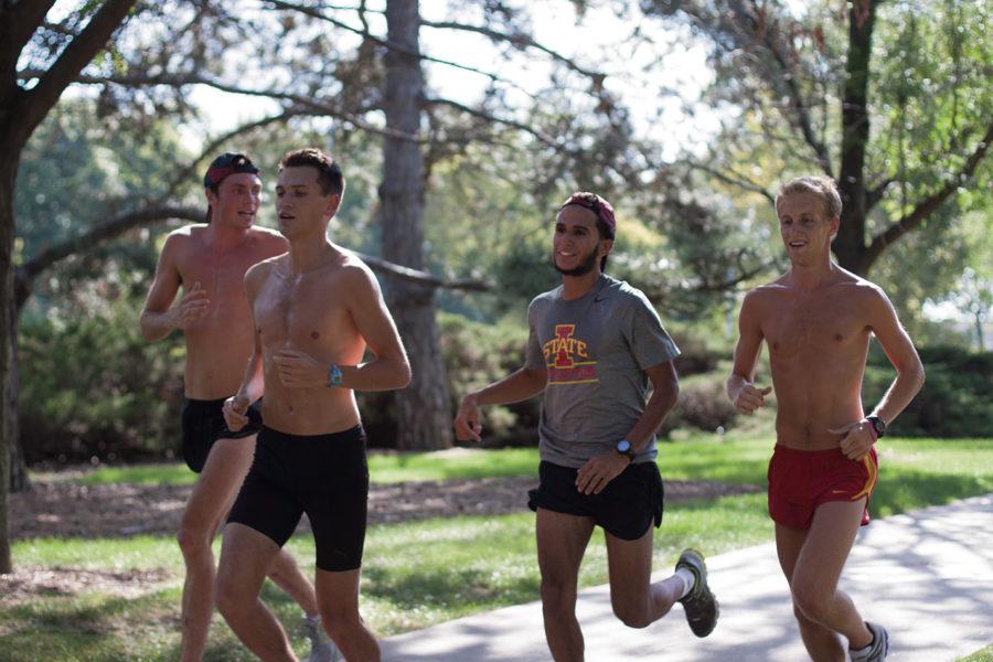 The mens cross-country team practices Monday, Aug. 20, on campus.

