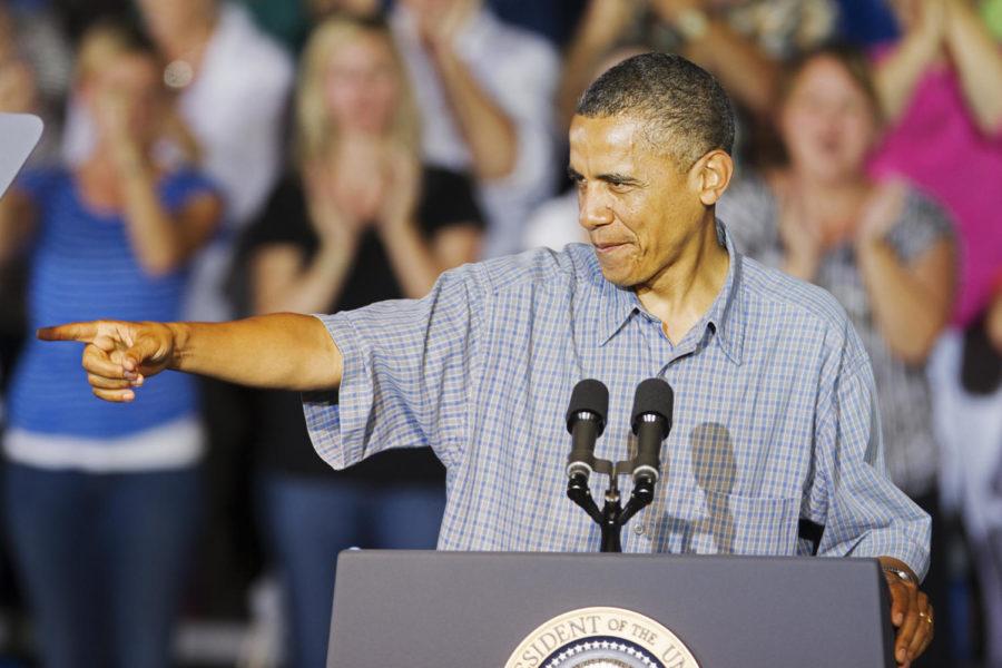 President Barack Obama greets an estimated 2,200 people in the Herman Park pavilion on Monday, August 13 in Boone, Iowa before speaking to the crowd. Obama kicked off a three-day bus tour through Iowa in Council Bluffs on Monday morning.

