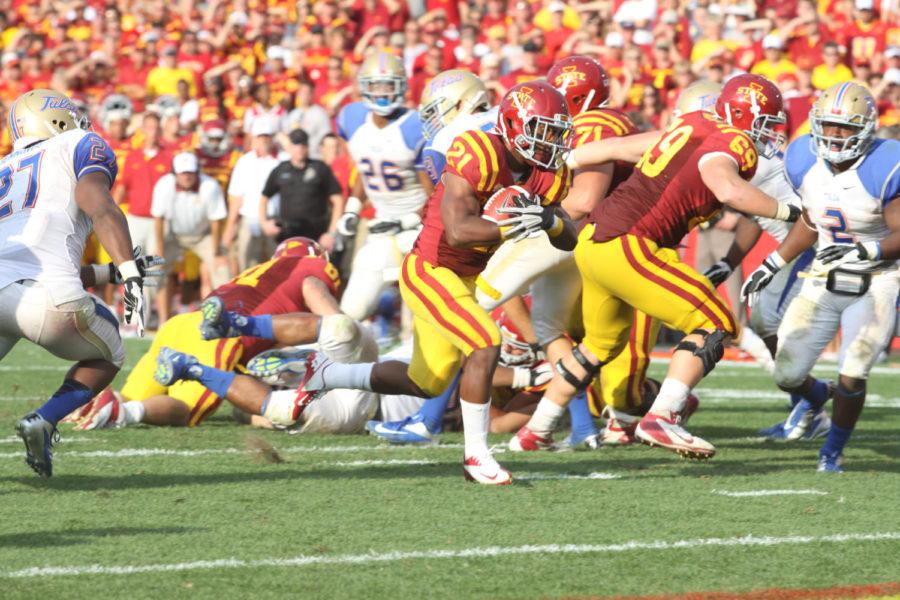 Shontrelle Johnson runs the ball for a touchdown during Saturdays game, Sept. 1, against Tulsa at Jack Trice Stadium. Johnson had a severe neck injury last season, which almost ended his career. He bounced back Saturday to rush for a career-high 120 yards. 
