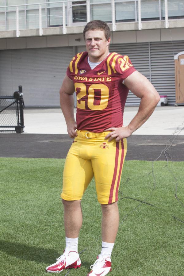 Linebacker Jake Knott hangs out, waiting to be interviewed, as part of football media day, Thursday, Aug. 2, on the field of Jack Trice Stadium. The football team opens the season at home on Sept. 1 against Tulsa.
