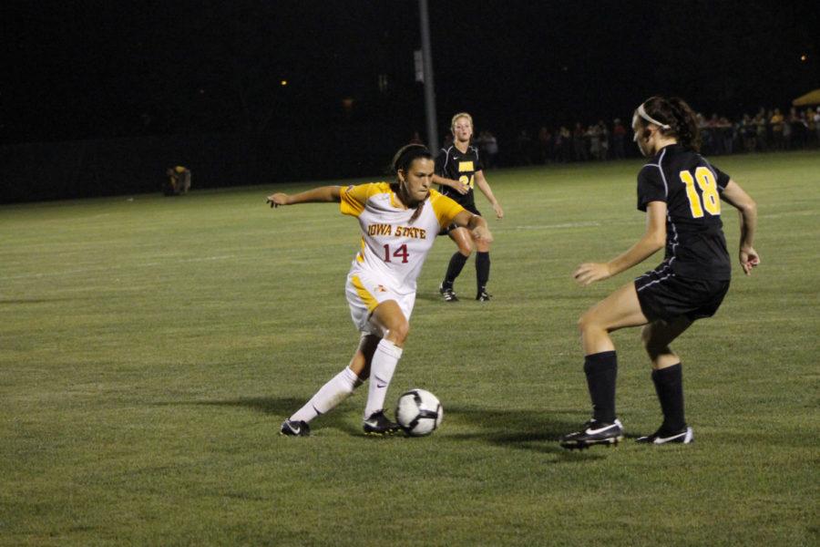 Meredith Skitt works to move the ball past a defender during the Cyclones soccer match against the Iowa Hawkeyes, Friday, Aug. 31, at the soccer complex. The Hawkeyes defeated the Cyclones 3-1.
