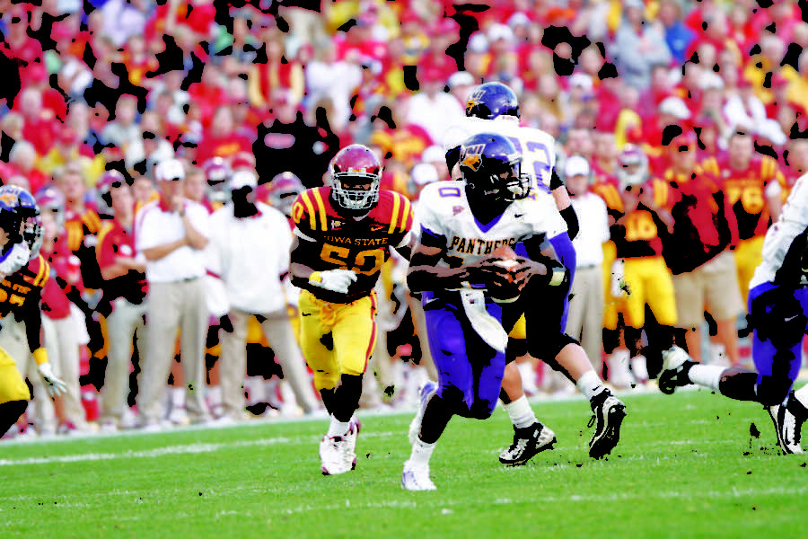 Defensive end Willie Scott goes after UNI’s quarterback Tirrell
Rennie during the game against Northern Iowa on Sep. 3. Scott had a
career-high of nine tackles throughout the game, and Iowa State
beat Northern Iowa with a score of 20-19.
