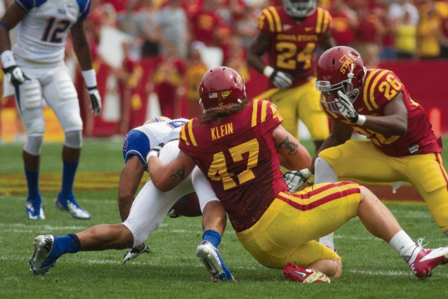 Linebacker+A.J.+Klein+takes+down+Tulsa+running+back+Alex+Singleton+during+the+first+quarter+of+the+season+opener.+Iowa+State+defeated+Tulsa+38-23+on+Saturday%2C+Sept.+1%2C+at+Jack+Trice+Stadium.%C2%A0%0A