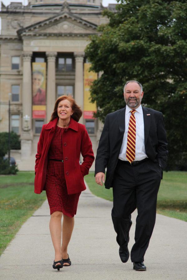 President Steven Leath and his wife Janet Leath walk down the sidewalk toward the luncheon. The picnic was Thursday, Sept. 13, on Central Campus to celebrate Leaths installation.

