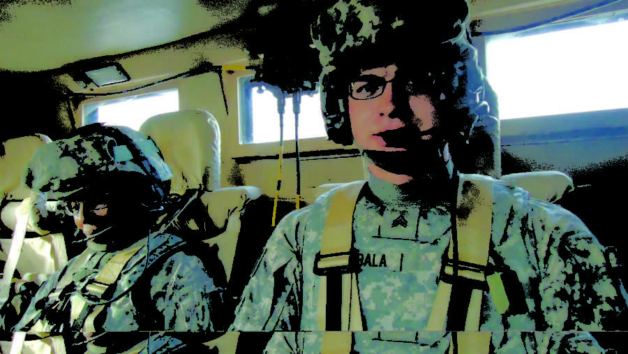 Nathan Durbala, right, is on a convoy to Baghdad to Saddam Husseins palace estates in October 2010.
