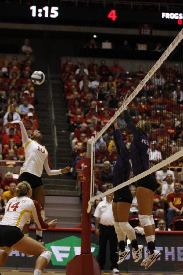 Victoria+Hurtt+jumps+up+to+hit+the+ball+back+over+the+net+to+TCU+on+Saturday%2C+Sept.+29%2C+2012+at+Hilton+Coliseum.+The+Cyclones+won+with+3-0.%0A