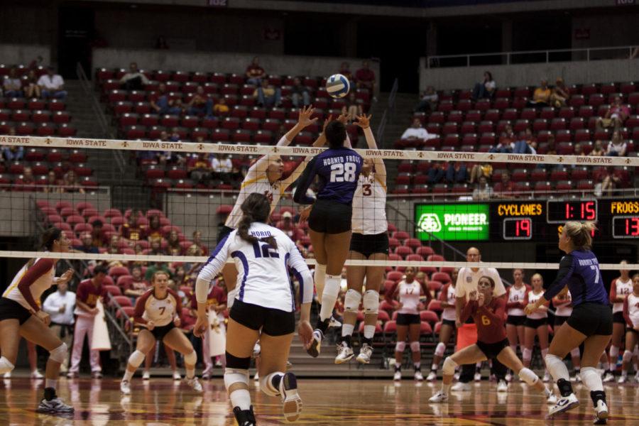 Jamie Straube and Rachel Hockaday play defense during the game against TCU on Saturday, Sept 29, at Hilton Coliseum. Cyclones won 3-0.
