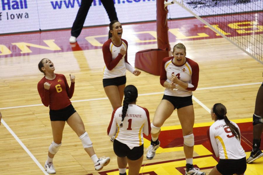The ISU volleyball team celebrates during the game against Baylor on Saturday, Sept. 22, at Hilton Coliseum. The Cyclones won the match 3-1 to open Big 12 Conference action. 
