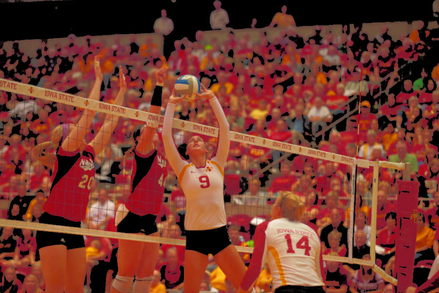 Alison Landwehr blocks the ball during the game against Nerbraska on Saturday, Sept. 15, at Hilton Coliseum. The Cyclones won 3-1. 
