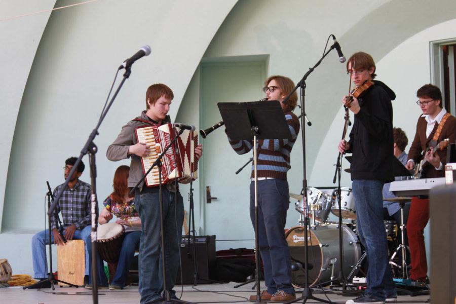 The Genre Music Club, made up of Ames Residents and ISU students, performs on Saturday, Sept. 21, during FACES at the Bandshell Park in Ames.
