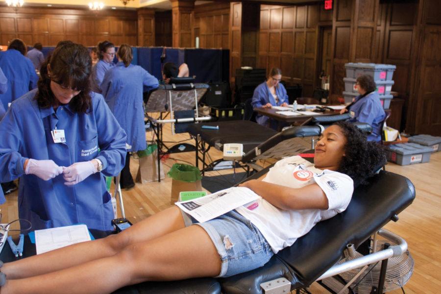 Shaquita Jones, freshman in kinesiology and health, donates blood for the ISU Spring Blood Drive Wednesday, March 21, in the Great Hall of the Memorial Union.
