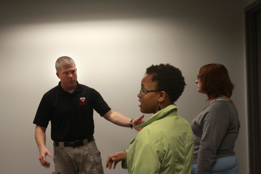 Lt. Elliott Florer teaches students how to protect themselves when emergency situations happen. The Department of Public Safety had a safety strategy course on how to protect against campus shooters, on Monday, Sept. 17, in the Armory. 

