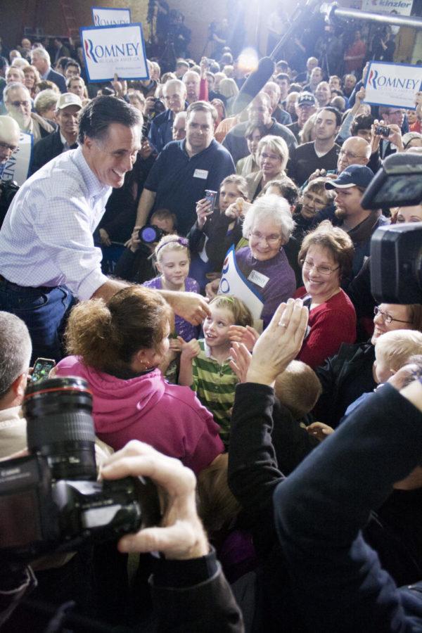 Former+Massachusetts+Gov.+Mitt+Romney+shakes+hands+and+signs+autographs+at+the+conclusion+of+his+speech+on+Thursday%2C+Dec.+29+at+Kinzler+Construction+in+Ames.%0A