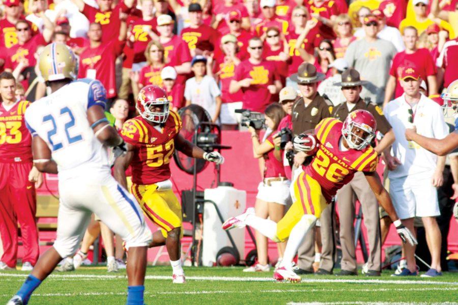 Defensive back Deon Broomfield returns an interception in the win against Tulsa on Sept. 1, 2012, at Jack Trice Stadium.