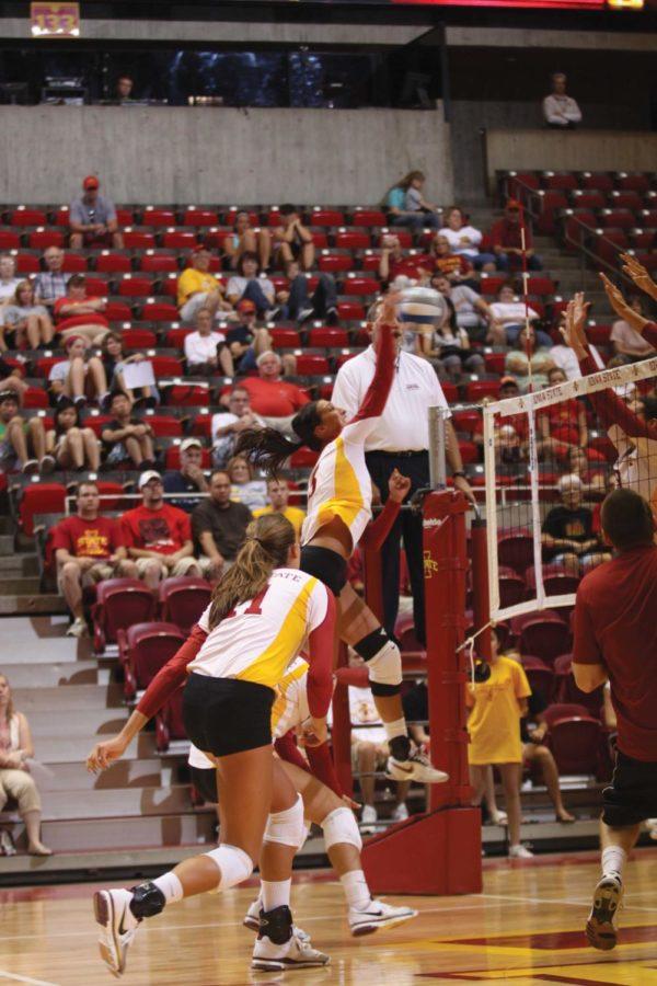 Rachel Hockaday hits the ball on Aug. 20 in Hilton Coliseum
during the Cardinal vs. Gold scrimmage.
