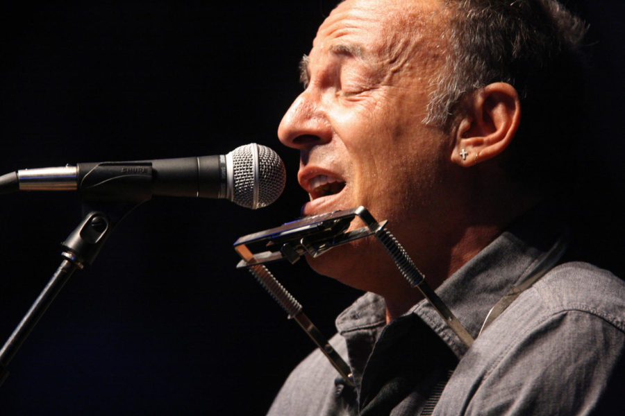 Singer Bruce Springsteen performs Thursday, Oct. 18, at Hilton Coliseum. His visit was a part of the Obama campaigns Campus Takeover events across Iowa this week.