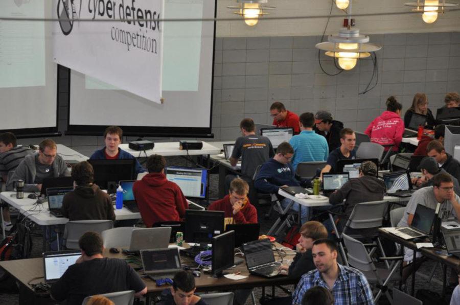 Teams compete at the ISU Cyber Defense Competition on Sept. 25. The competition pits cyber security professionals against teams of students to discover which teams defenses hold up the best.
