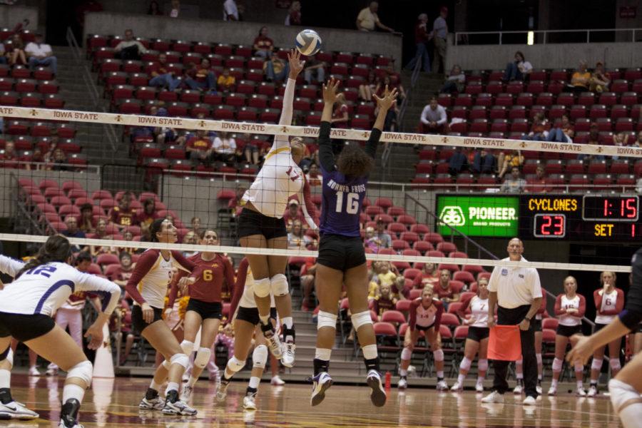 Tenisha Matlock hits the ball back over the net during a match against TCU on Saturday, Sept. 29, at Hilton Coliseum. Cyclones won with 3-0.
