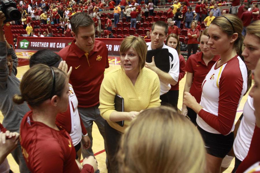Coach Christy Johnson-Lynch talks to the players after the game against Nebraska on Saturday, Sept. 15, at Hilton Coliseum. Cyclones won 3-1, which is the first time Cyclone volleyball team has defeated a No. 1 team in school history. 
