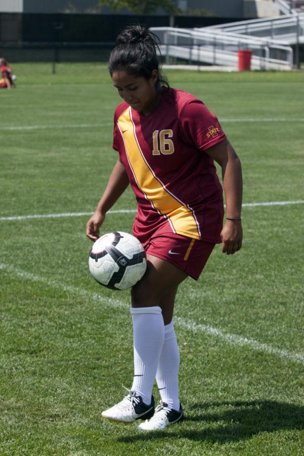 Forward Jennifer Dominguez shows her ball handling skills while posing for a picture during media day, Monday, Aug. 13, in Ames. The Cyclones open the season this weekend against Nebraska-Omaha in Omaha, Neb.

