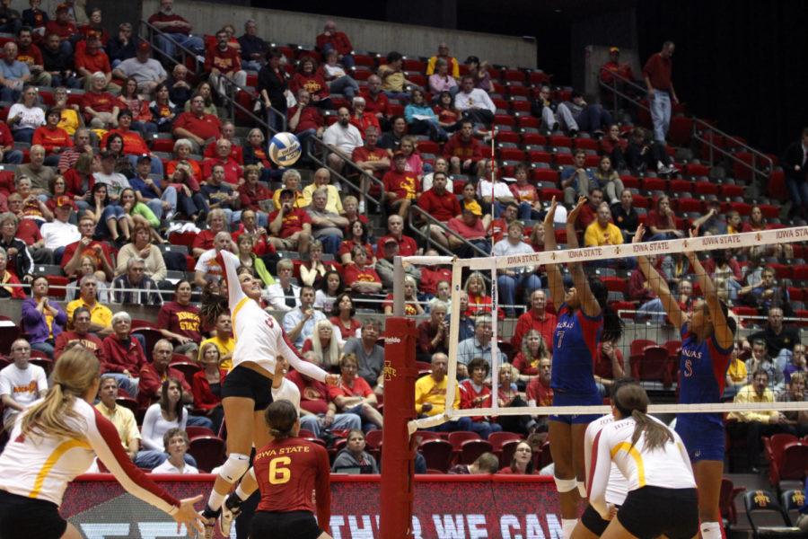 ISU volleyball player Rachel Hockaday prepares to send the volleyball over the net against the Kansas Jayhawks on Wednesday, Oct. 24, at Hilton Coliseum. The Cyclones won the match 3-1.
