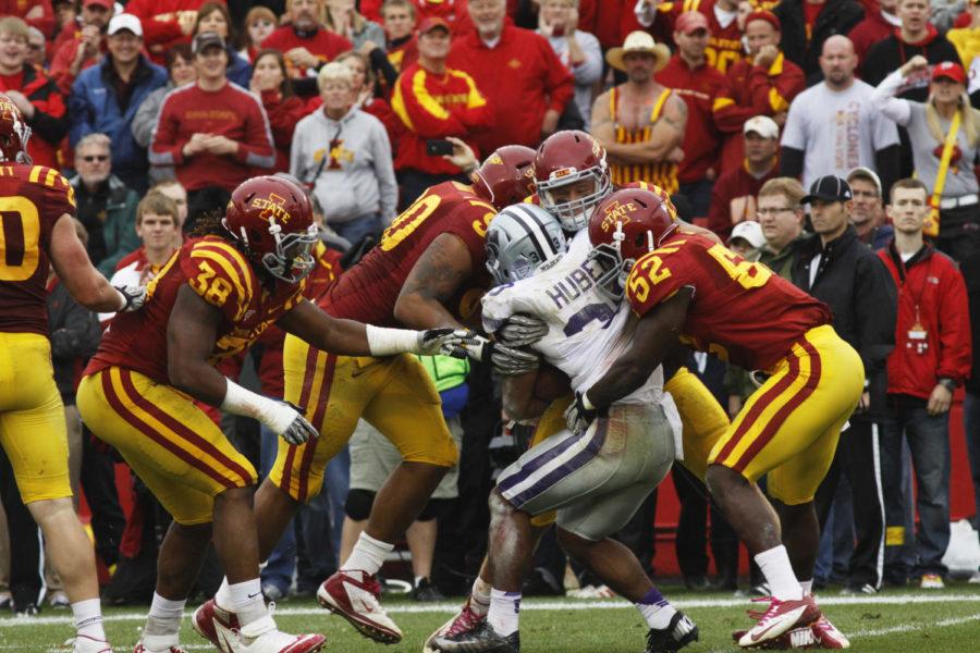 The Cyclone defense raps up the Wildcats No. 33 John Hubert in the backfield, successfully stopping Kansas States attempt at a first down. After a long battle, Iowa State fell to Kansas State with a final score of 27-21 on Saturday, Oct. 13, at Jack Trice Stadium.
