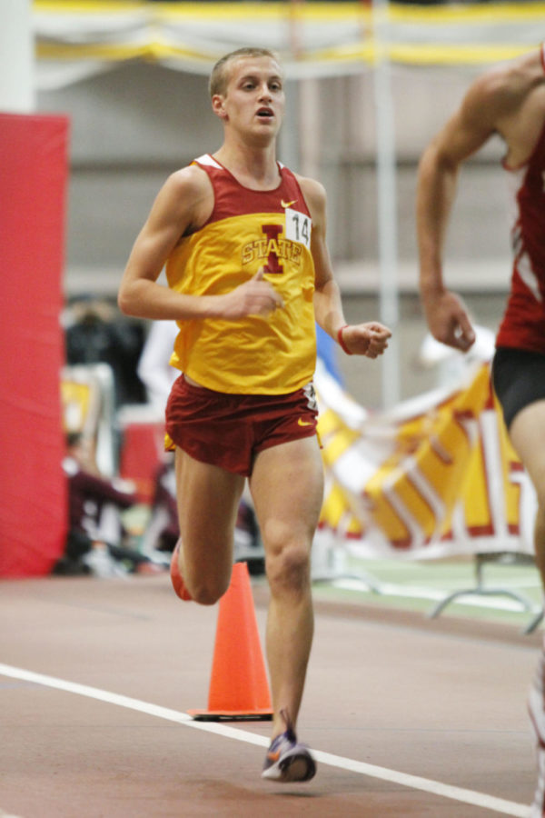 Charlie Paul participates in the 5,000-meter run for the Iowa State Classic on Saturday, Feb. 11, 2012 at Lied. Paul finished the race with a time of 14:23.89.
