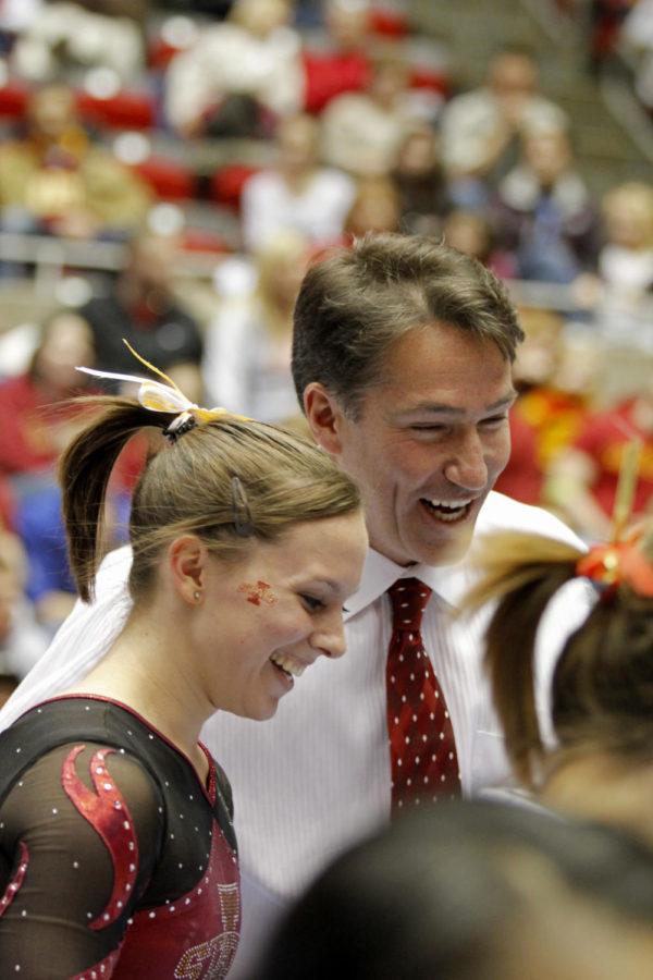 ISU coach Jay Ronayne celebrates with Michelle Shealy after her
participation in the bars Friday, Jan. 20.
