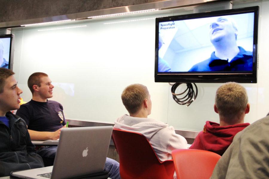 Students in Aerospace Engineering 136 listen to Richard Wlezien, professor of areospace engineering, give a lecture in the new classroom in Howe Hall on Wednesday, Nov. 14. The classroom has 12 screens, allowing students anywhere in the room to easily see. The glass which circles the room is also a whiteboard, allowing anyone to write on them.

