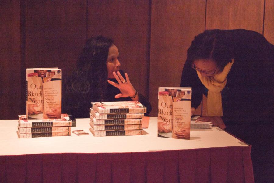 Author Maggie Anderson discusses her book during a signing. For the whole year of 2009, Anderson and her family bought from black-owned businesses as much as possible — and recounted the story in her book One Black Year.
