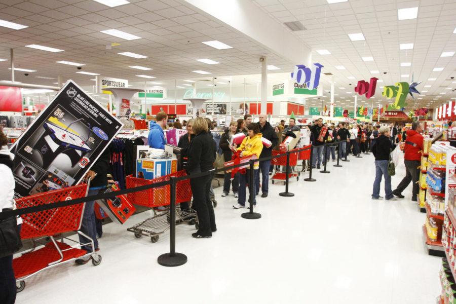 Shoppers begin to line up as they wait to be checked out at Target in Ankeny, Iowa, on Black Friday, Nov. 23. This year, Target decided to open its doors at 9 p.m. Thanksgiving night instead of midnight.
