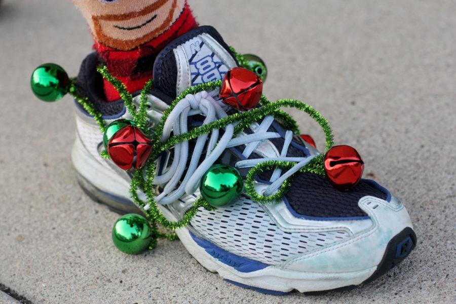 A runners shoe is equipped with bells for the Jingle Jog. The 5k is breaking records this year with a high number of participants, as well as money earned.
