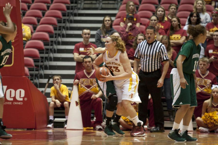 Chelsea Poppens drives toward the basket in the first half against the Bearcats in an exhibition game Thursday, Nov. 1, at Hilton Coliseum. Poppens led the Cyclones in scoring and rebounds with 22 points and 11 rebounds. 
