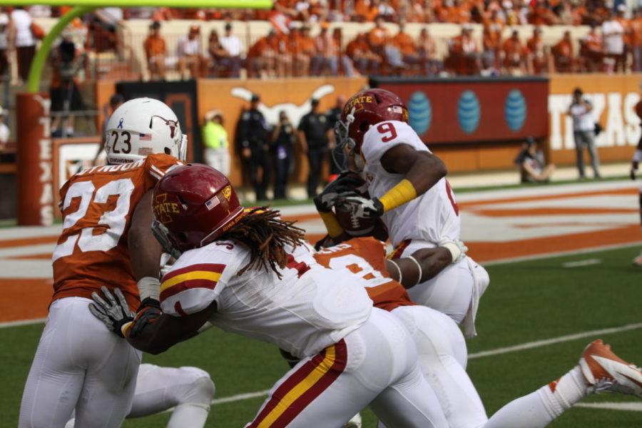 Wide receiver Quenton Bundrage breaks a tackle and runs in for the Cyclones only touchdown against the Longhorns on Saturday, Nov. 10, at Darrell K. Royal-Texas Memorial Stadium. The Cyclones fell to the Longhorns 33-7.
