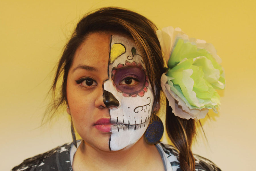 Irma Tello sophomore in Math poses for Day of the Dead.

