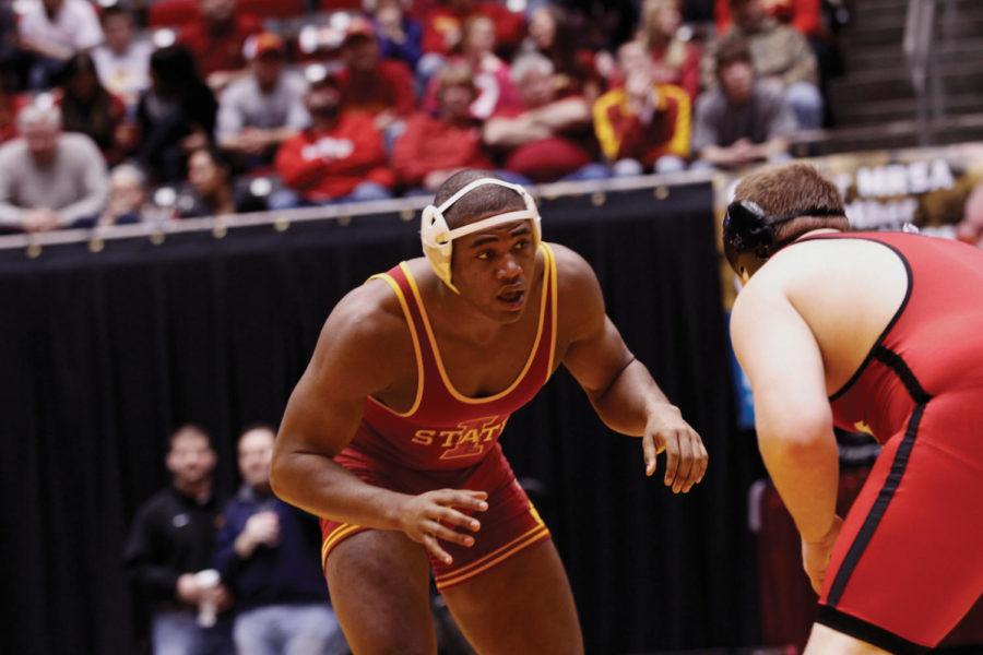 Heavyweight+wrestler+Matt+Gibson+faces+Wisconsins+heavyweight%0ACole+Tobin+in+a+close+match.+Gibson+won+by+decision+over+Tobin+with%0Aa+final+score+of+5-2.+The+Iowa+State+wresting+team+held+the+Iowa%0AState+Regional+on+Sunday.+The+team+matched+up+against+the+Wisconsin%0ABadgers+and+won+with+a+final+team+score+of+33-3.%C2%A0%0A