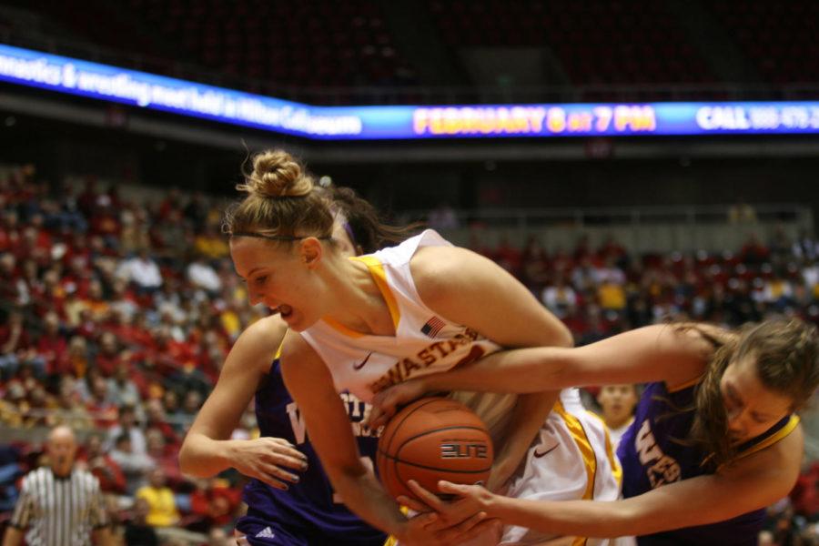 Anna Prins fights for the ball against a Western Illinois player on Nov. 11, 2012 at Hilton Coliseum. Prins had 14 points, 8 rebounds, and 4 assists in the win over Western Illinois 84-65.
