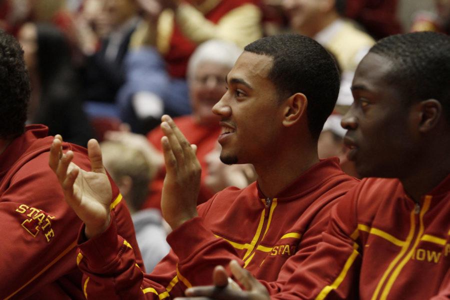 Austin McBeth cheers on his teammates during the game against
Oklahoma on Saturday, Feb. 18, at Hilton Coliseum. The Cyclones are
now 19-8 after defeating the Sooners.
