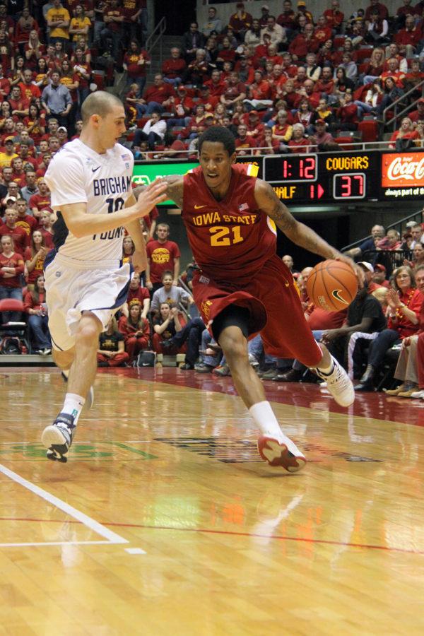 Will Clyburn, No. 21, evades BYU player Matt Carlino. Clyburn saw 30 minutes of play in the 83-62 victory.
