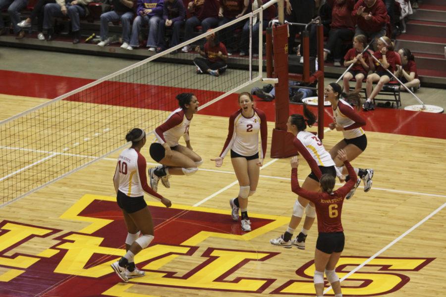 The team celebrates as they score during the 5th set against the North Carolina Tarheels on Nov. 30, 2012 at Hilton Coliseum.
