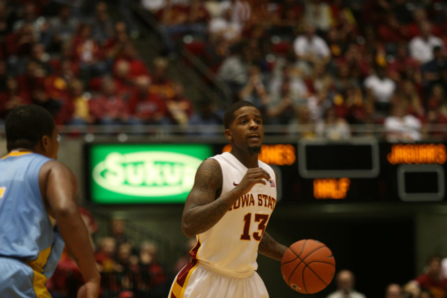 Korie Lucious calls out a play at the top of the key on Nov. 9, 2012 at Hilton Coliseum against the Southern University Jaguars.
