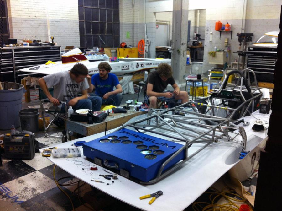 Members of PrISUm assemble their new solar car Hyperion in June. PrISUm took second place in the American Solar Challenge. They are currently designing a new car to compete in 2014.
