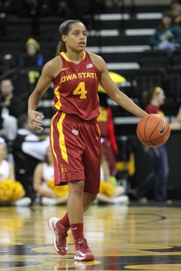 Sophomore guard Nikki Moody brings the ball up the court against Iowa on Thursday, Dec. 6, at Carver Hawkeye Arena. The Cyclones lost 50-42.
