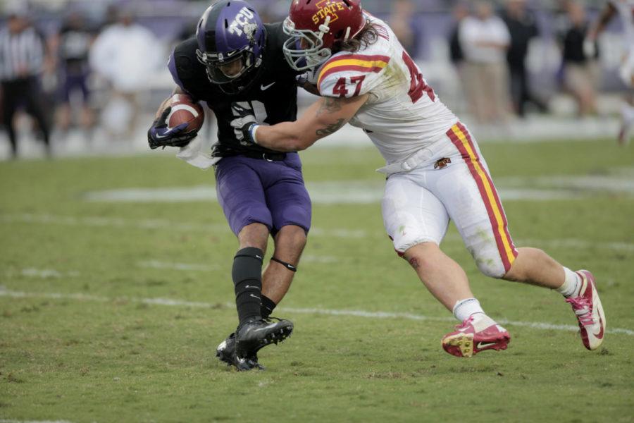 Linebacker A.J. Klein tackles TCU wide receiver Brandon Carter on Saturday, Oct. 6, at Amon G. Carter Stadium in Fort Worth, Texas. Klein had nine solo tackles including one sack in the 37-23 victory against TCU 
