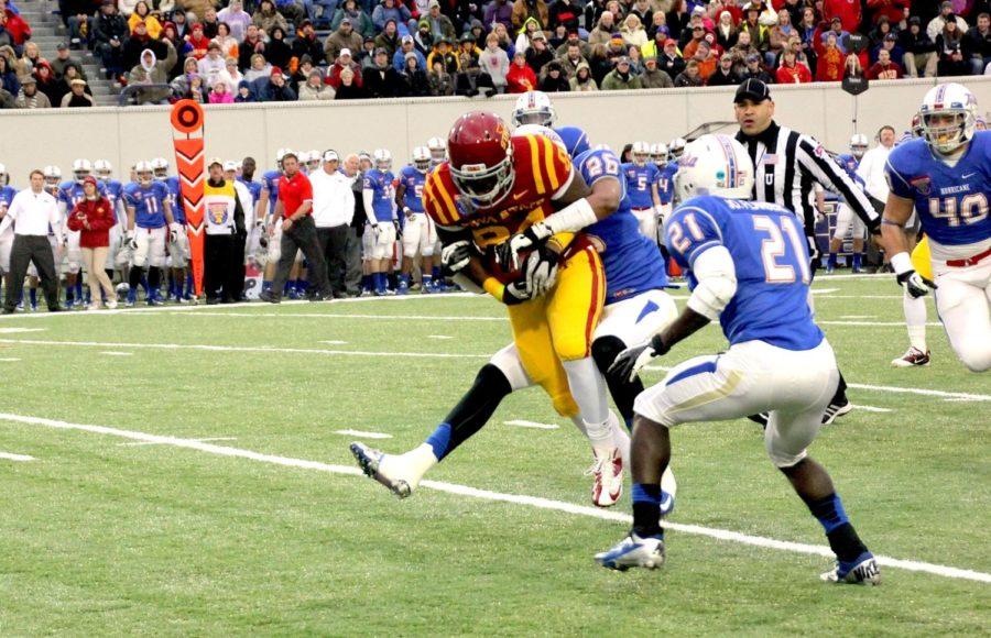 Redshirt junior tight end Ernst Brun catches a pass before being engulfed by the Tulsa defense at the Liberty Bowl on Dec. 31, 2012.  The Cyclones lost to the Golden Hurricane 31-17 in the 54th Liberty Bowl.
