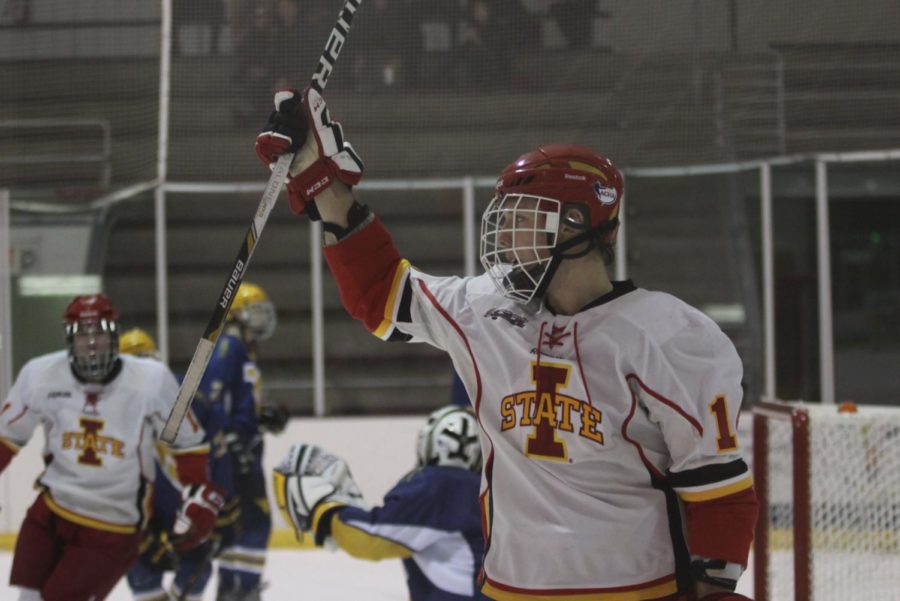 Sophomore forward James Buttermore celebrates his goal against the WVU Mountaineers on Saturday, Nov. 24, at the Ames/ISU Ice Arena. The Cyclones won 2-1.
